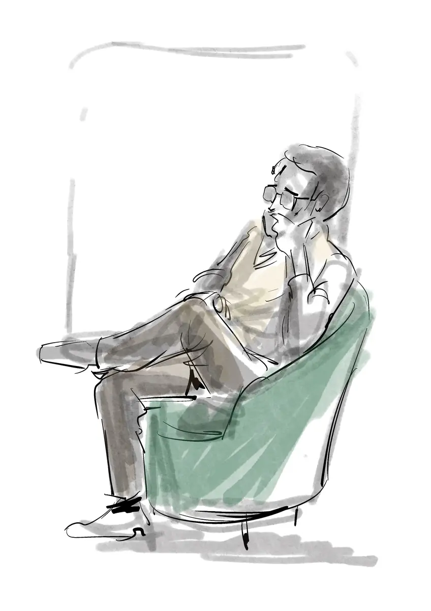 Man seated in a green armchair, thoughtful — live watercolour sketch by Sana Hosseinpour